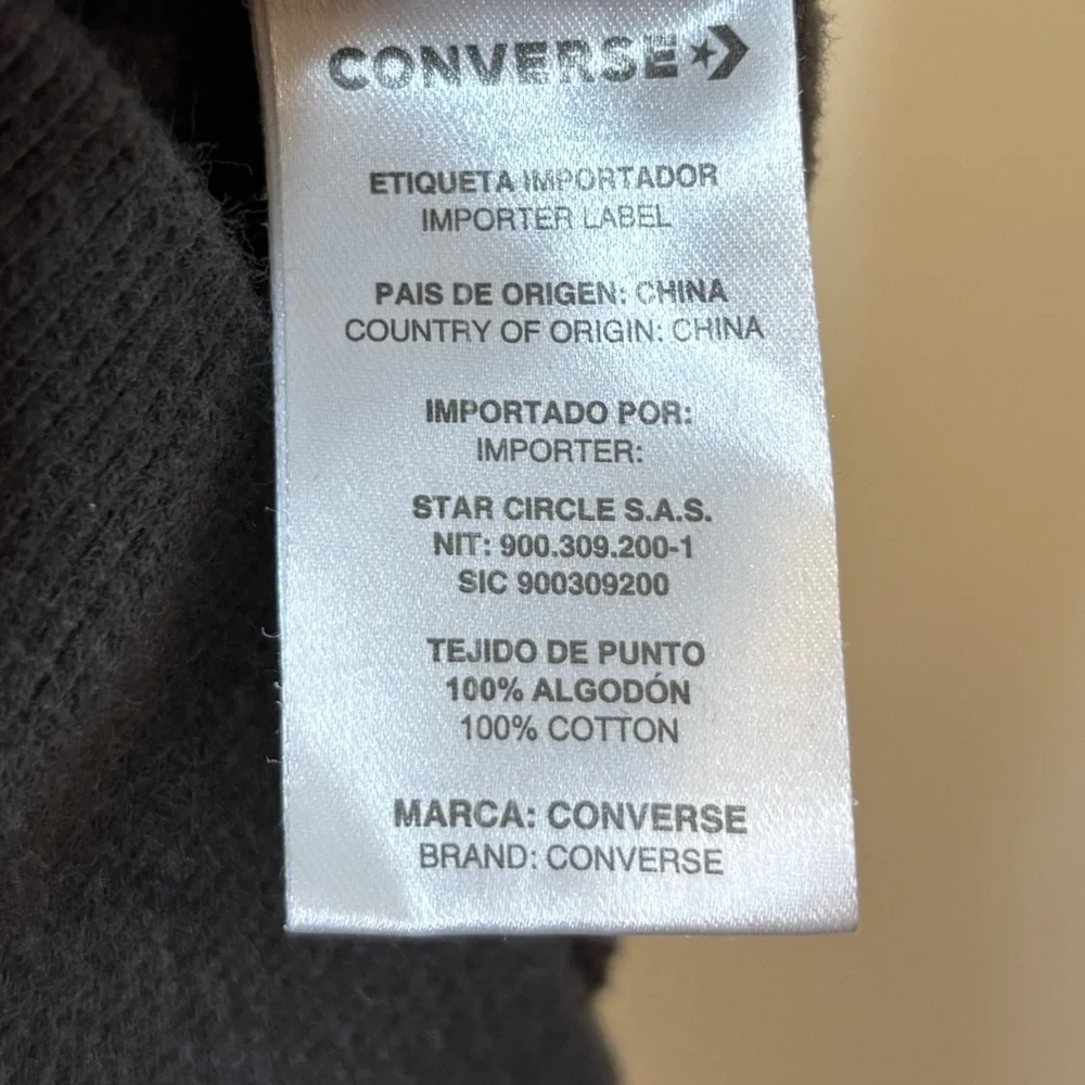 Converse Gold Standard Loose-Fit Pullover Hoodie in black with a gold logo.